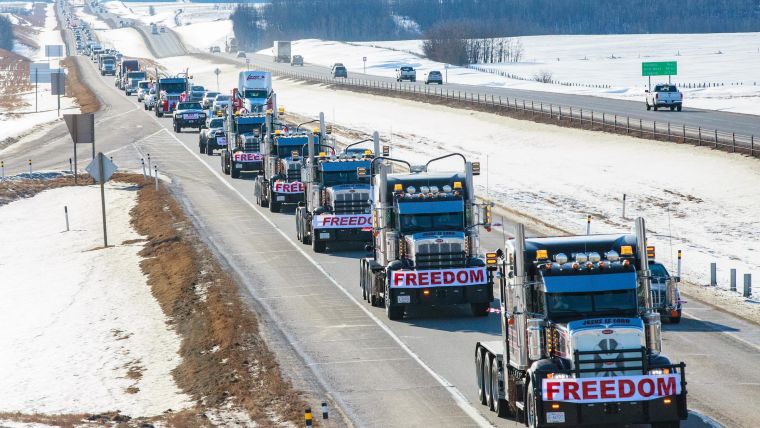 FREEDOM convoy taken in Central Alberta, Queen Elizabeth Highway 2 on the way to the Legislature Building in Edmonton. This demonstration was in support of the FREEDOM, Anti-mandate Protest, with Truckers demonstrating in Ottawa, Ontario, Canada. Taken by Naomi McKinney, McKinney Psychology.