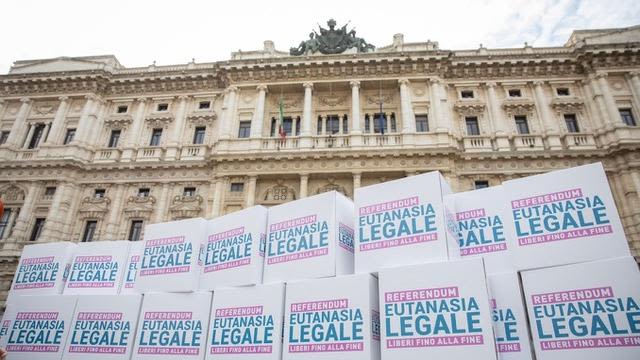 (September 2021) Signs from the Italian campaign in support of a referendum to legalise euthanasia.