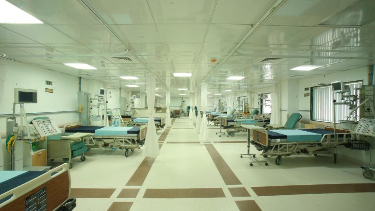 A row of hospital beds.